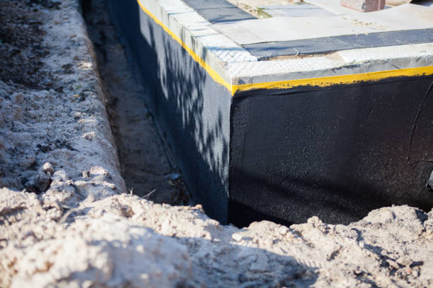 Professional Basement Waterproofing technician working in Waverly, MN